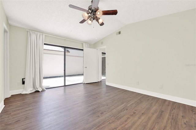 2815 Spyglass Cv, Longwood, FL 32779 - spare room featuring ceiling fan, vaulted ceiling, and dark wood-style floors