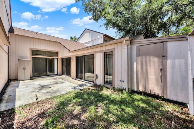 2815 Spyglass Cv, Longwood, FL 32779 - back of property featuring a patio and roof with shingles