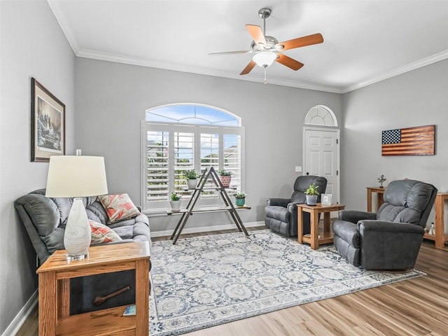 16863 SE 110th Court Rd, Summerfield, FL 34491 - living room with wood finished floors, crown molding, and ceiling fan