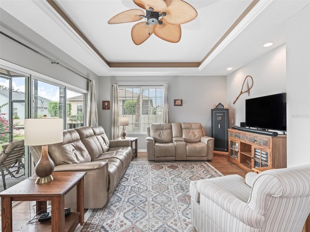 16863 SE 110th Court Rd, Summerfield, FL 34491 - living area featuring ceiling fan, a raised ceiling, wood finished floors, and recessed lighting