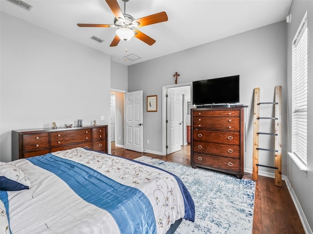 16863 SE 110th Court Rd, Summerfield, FL 34491 - bedroom featuring wood finished floors, multiple windows, and ceiling fan