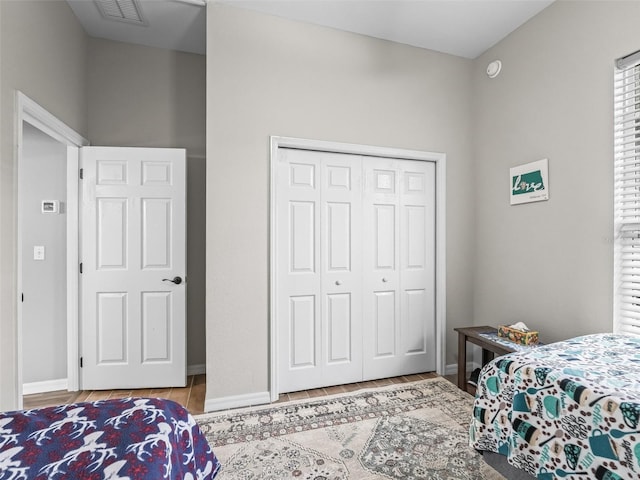 16863 SE 110th Court Rd, Summerfield, FL 34491 - bedroom featuring a closet and wood tiled floors