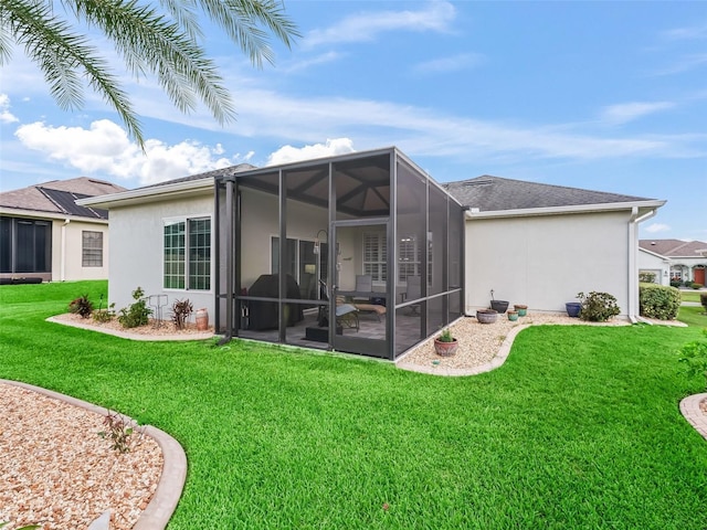 16863 SE 110th Court Rd, Summerfield, FL 34491 - rear view of house with a lawn and stucco siding
