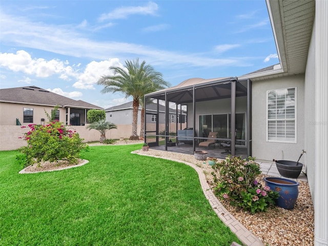 16863 SE 110th Court Rd, Summerfield, FL 34491 - view of green lawn with a patio and glass enclosure