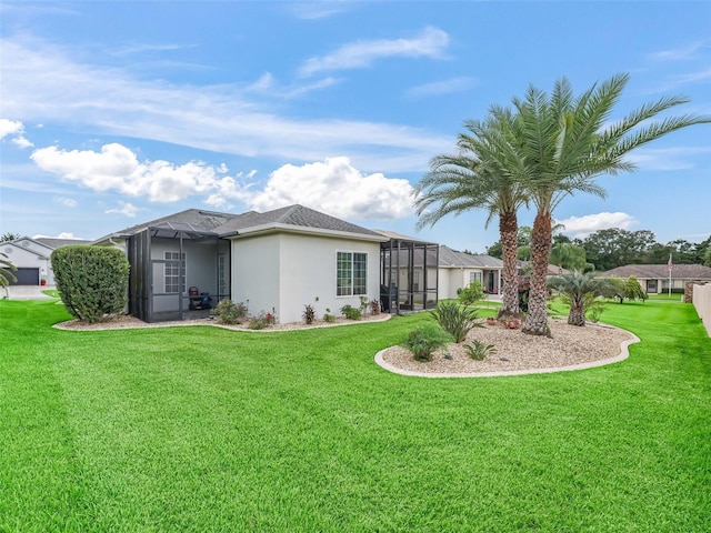 16863 SE 110th Court Rd, Summerfield, FL 34491 - rear view of property with a lawn, stucco siding, and glass enclosure