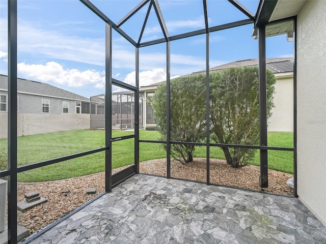 16863 SE 110th Court Rd, Summerfield, FL 34491 - unfurnished sunroom featuring healthy amount of natural light