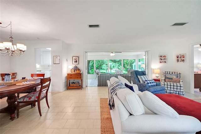 5319 Eagles Nest Rd, Fruitland Park, FL 34731 - living room with a chandelier and ceiling fan