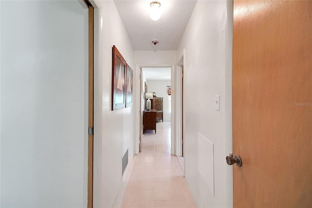 5319 Eagles Nest Rd, Fruitland Park, FL 34731 - corridor featuring light tile patterned flooring and baseboards