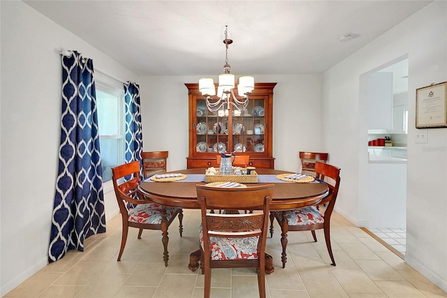 5319 Eagles Nest Rd, Fruitland Park, FL 34731 - dining area featuring a chandelier and light tile patterned flooring