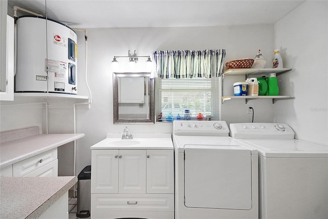 5319 Eagles Nest Rd, Fruitland Park, FL 34731 - laundry room featuring washer and clothes dryer, cabinet space, and water heater