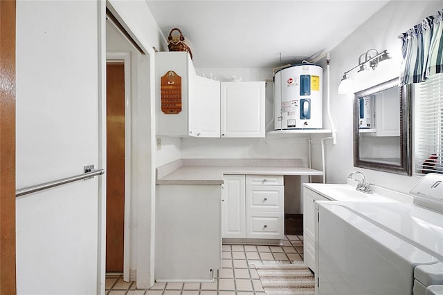 5319 Eagles Nest Rd, Fruitland Park, FL 34731 - washroom with cabinet space, electric water heater, and separate washer and dryer