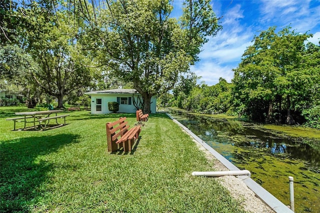 5319 Eagles Nest Rd, Fruitland Park, FL 34731 - view of grassy yard featuring a water view