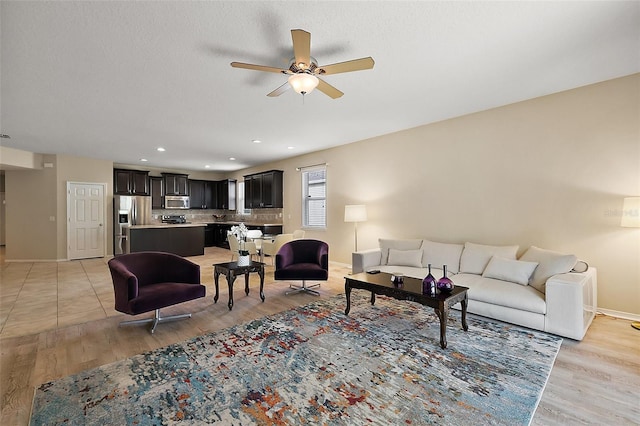 20945 Oldenburg Loop, Mount Dora, FL 32757 - living room featuring light wood-style flooring, ceiling fan, and recessed lighting