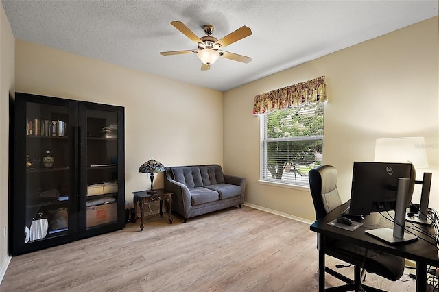 20945 Oldenburg Loop, Mount Dora, FL 32757 - home office featuring light wood finished floors and a ceiling fan