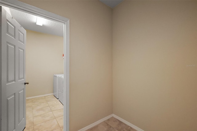 20945 Oldenburg Loop, Mount Dora, FL 32757 - laundry area with washing machine and clothes dryer and light tile patterned flooring