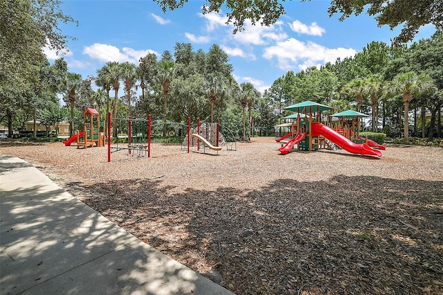 20945 Oldenburg Loop, Mount Dora, FL 32757 - community jungle gym with view of wooded area