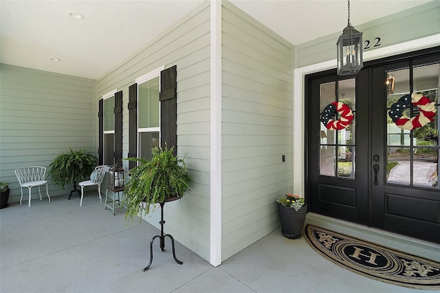 622 W 11th Ave, Mount Dora, FL 32757 - property entrance with a porch and french doors