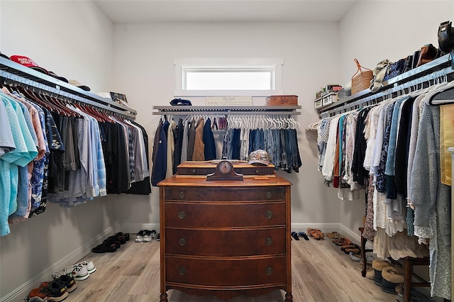 622 W 11th Ave, Mount Dora, FL 32757 - spacious closet featuring wood finished floors