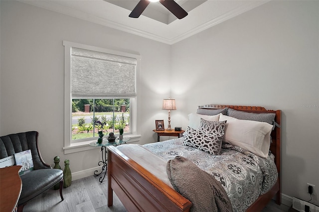 622 W 11th Ave, Mount Dora, FL 32757 - bedroom with wood finished floors, ornamental molding, and a ceiling fan