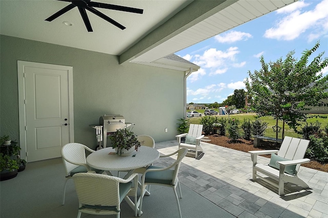 622 W 11th Ave, Mount Dora, FL 32757 - view of patio with grilling area and a ceiling fan