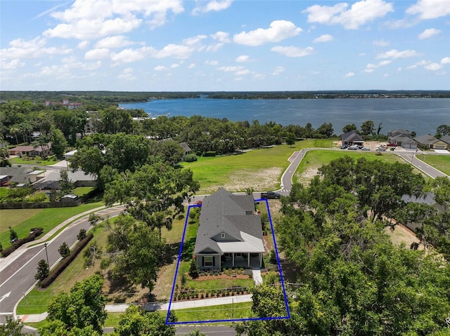 622 W 11th Ave, Mount Dora, FL 32757 - aerial view of property and surrounding area with property boundaries highlighted and a nearby body of water