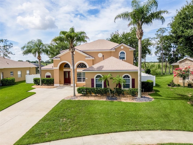 4548 Barrister Dr, Clermont, FL 34711 - mediterranean / spanish house with stucco siding and concrete driveway