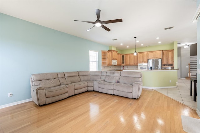 4548 Barrister Dr, Clermont, FL 34711 - living area featuring ceiling fan, recessed lighting, and light wood-style flooring