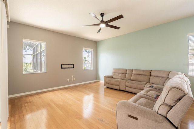 4548 Barrister Dr, Clermont, FL 34711 - living room featuring ceiling fan and light wood-style flooring