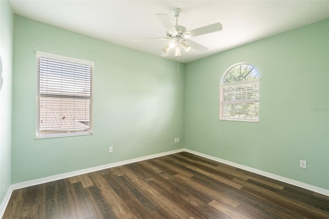 4548 Barrister Dr, Clermont, FL 34711 - unfurnished room featuring dark wood finished floors and a ceiling fan