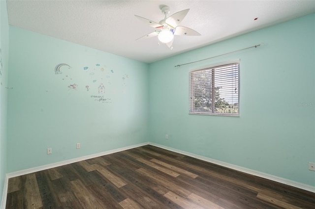4548 Barrister Dr, Clermont, FL 34711 - spare room with dark wood-style flooring and ceiling fan