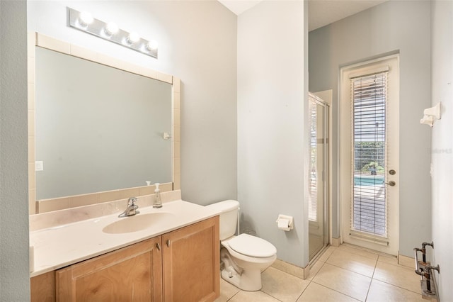 4548 Barrister Dr, Clermont, FL 34711 - full bath with tile patterned floors, vanity, and a shower stall