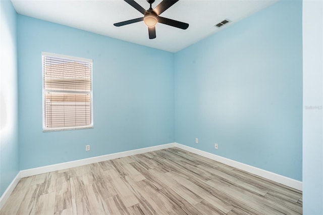 4548 Barrister Dr, Clermont, FL 34711 - spare room featuring wood finished floors and ceiling fan