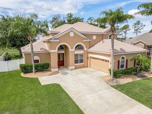 4548 Barrister Dr, Clermont, FL 34711 - view of front of property with a shingled roof, a garage, concrete driveway, and stucco siding