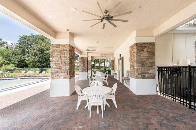 4548 Barrister Dr, Clermont, FL 34711 - view of patio with ceiling fan and outdoor dining area