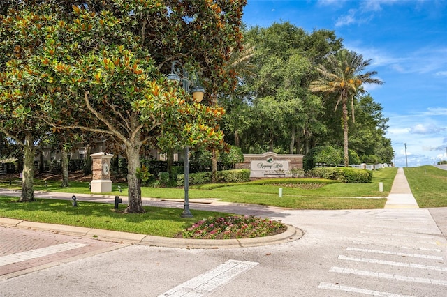 4548 Barrister Dr, Clermont, FL 34711 - surrounding community featuring a yard and uncovered parking