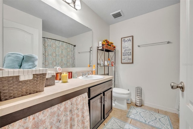 2488 Begonia St, Mascotte, FL 34753 - full bath featuring tile patterned floors, vanity, and backsplash