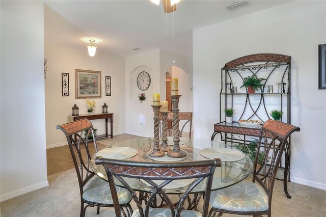 6906 Glenbrook Dr, Lakeland, FL 33811 - dining room featuring light carpet and arched walkways
