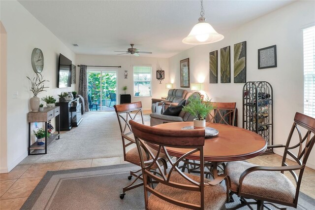 6906 Glenbrook Dr, Lakeland, FL 33811 - dining space with ceiling fan and light tile patterned floors