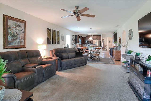 6906 Glenbrook Dr, Lakeland, FL 33811 - living area featuring a ceiling fan and light colored carpet