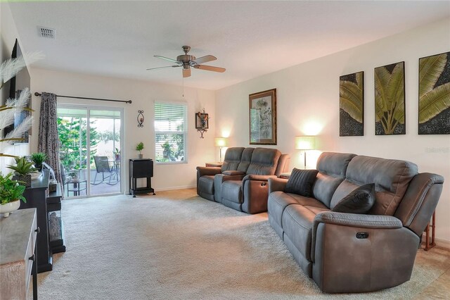 6906 Glenbrook Dr, Lakeland, FL 33811 - living area featuring light carpet and ceiling fan