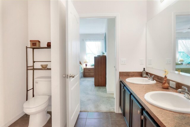 6906 Glenbrook Dr, Lakeland, FL 33811 - bathroom with ensuite bathroom, plenty of natural light, double vanity, and tile patterned floors