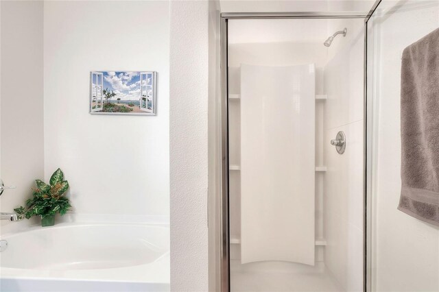 6906 Glenbrook Dr, Lakeland, FL 33811 - full bathroom with a stall shower and a bath
