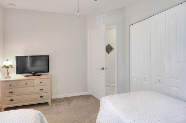6906 Glenbrook Dr, Lakeland, FL 33811 - bedroom featuring light carpet and a closet