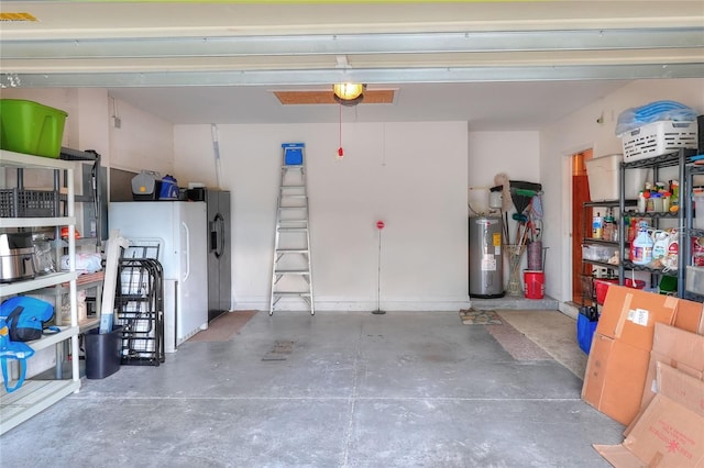 6906 Glenbrook Dr, Lakeland, FL 33811 - garage with electric water heater and a garage door opener