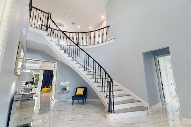 1702 Hidden Palms Dr, Davenport, FL 33897 - stairway featuring a high ceiling, marble tiled flooring, and recessed lighting