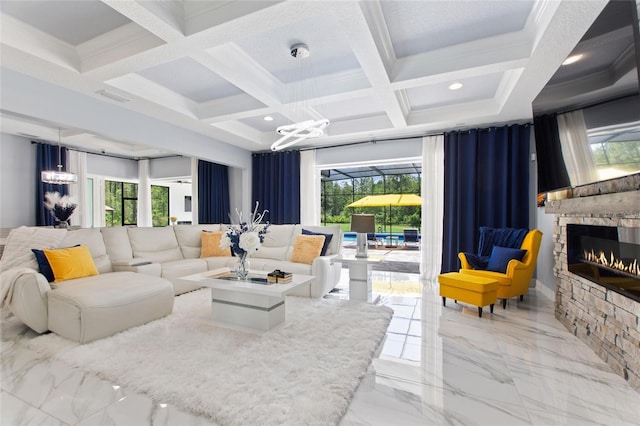 1702 Hidden Palms Dr, Davenport, FL 33897 - living room featuring a chandelier, a stone fireplace, healthy amount of natural light, coffered ceiling, and marble finish floors