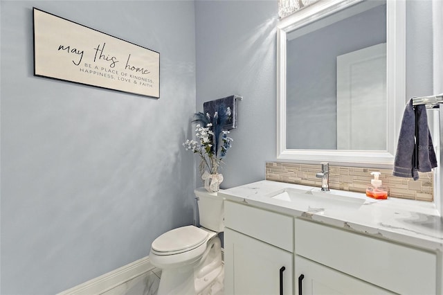 1702 Hidden Palms Dr, Davenport, FL 33897 - half bath featuring vanity, decorative backsplash, and marble finish floors
