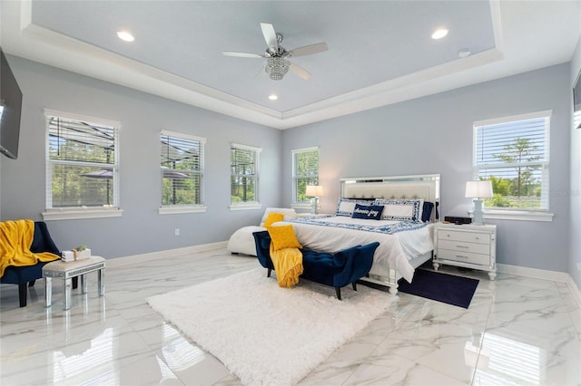 1702 Hidden Palms Dr, Davenport, FL 33897 - bedroom featuring a raised ceiling, marble tiled flooring, recessed lighting, and a ceiling fan