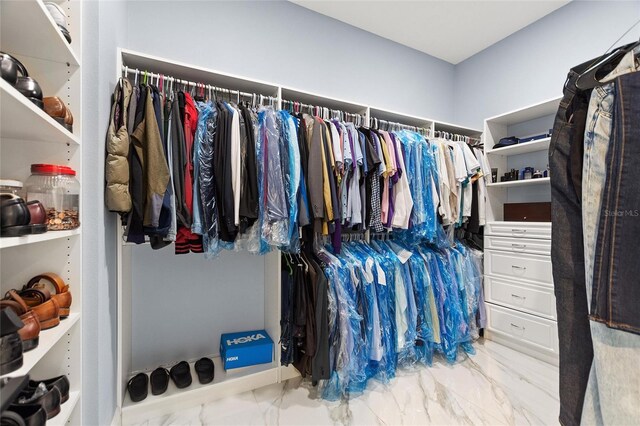 1702 Hidden Palms Dr, Davenport, FL 33897 - walk in closet featuring marble finish flooring
