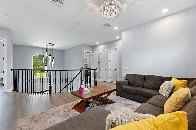1702 Hidden Palms Dr, Davenport, FL 33897 - living room featuring a chandelier, wood finished floors, and recessed lighting